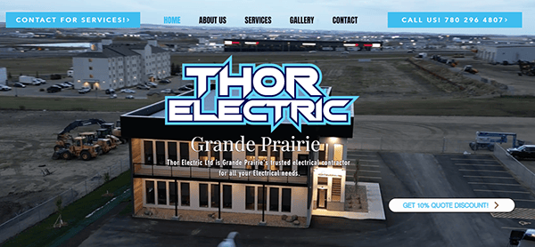 Aerial view of Thor Electric building in Grande Prairie with website navigation menu and contact information displayed at the top.