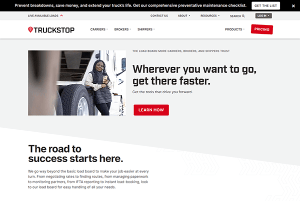 A website page of Truckstop shows a woman in front of a truck and several menu options. There's text promoting tools for carriers, brokers, and shippers with a button labeled "Learn More.