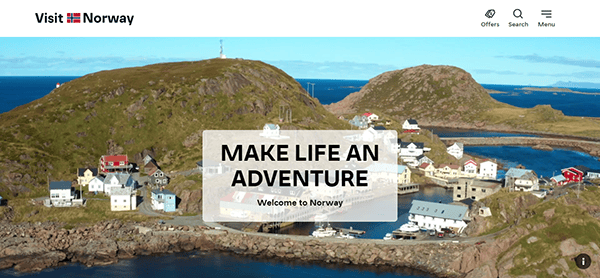 A coastal village with colorful houses nestled against rocky hills is shown. Text overlay reads, "MAKE LIFE AN ADVENTURE - Welcome to Norway." The top header includes options for offers, search, and menu.