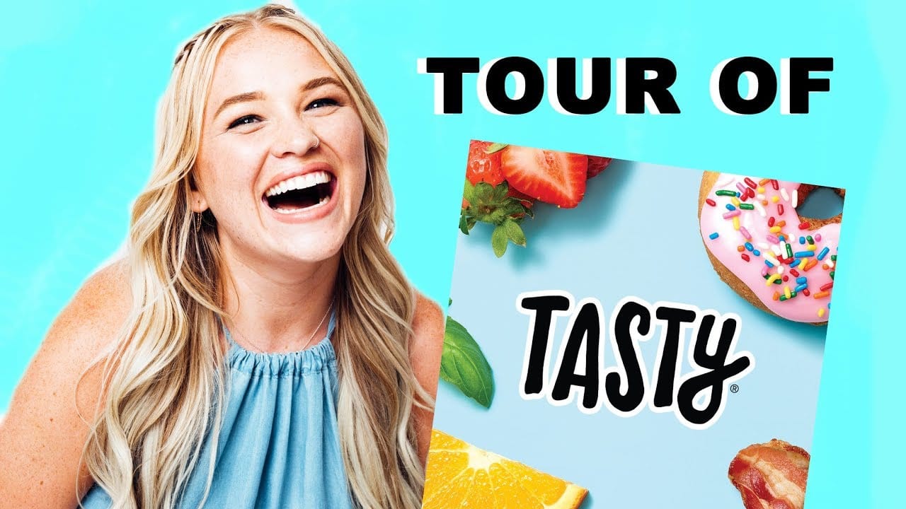 Smiling woman beside a graphic with strawberries, a sprinkled donut, and an orange slice, featuring the text "Tour of Tasty"—a delightful representation of effective social media advertising.