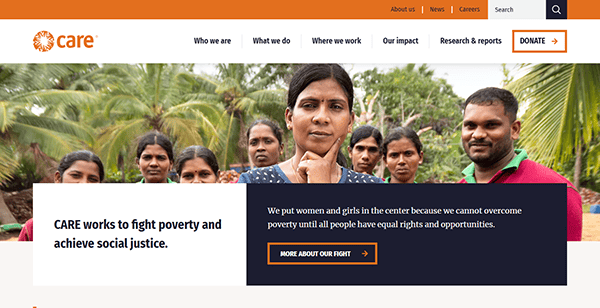 A group of people stands outdoors, highlighting a prominent woman at the center. This banner for CARE showcases their mission to fight poverty and achieve social justice, underscoring why they are considered one of the best charities today.