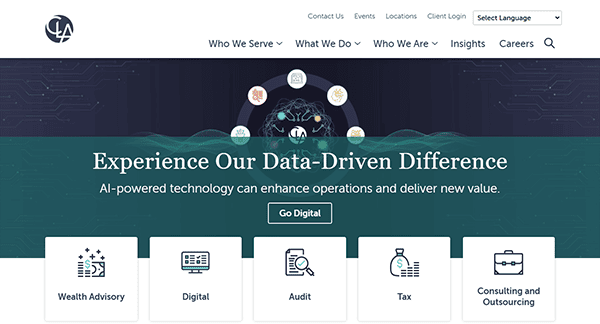 Discover our website homepage, crowned by a navigation menu at the top. Central text invites you to "Experience Our Data-Driven Difference." Below, icons highlight Wealth Advisory, Digital, Audit, Tax, Consulting, and Outsourcing services from one of the best accounting firm websites.