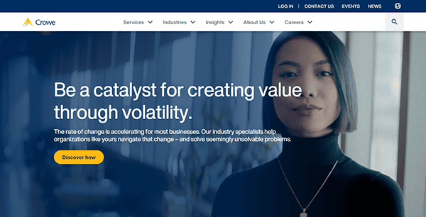 The Crowe website homepage, known as one of the best accounting firm websites, features a headline about creating value through volatility. A woman with dark hair is in the background. The top navigation bar includes services and contact options.