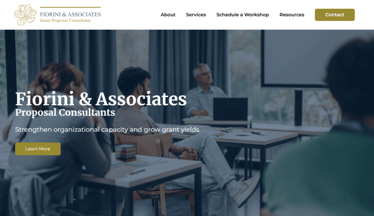 Screenshot of a consultancy firm’s website highlighting services in grant writing, with images of people in discussions. Sections include mission statement, services, and contact information.