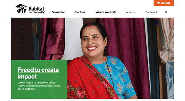 A woman in traditional attire stands smiling. The text reads, "Freed to create impact–Laxmi wants to empower other Haliya women to achieve economic independence." The Habitat for Humanity logo, noted for being featured on charity websites, is visible.