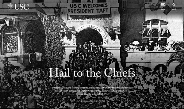 Black and white historical photo of a large crowd at a USC building with a banner reading "USC Welcomes President Taft" in the background, capturing a moment often featured on university websites as part of their storied legacy.