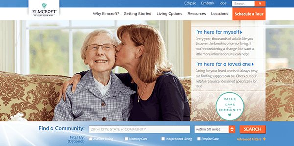 Elderly woman smiling warmly as a younger woman lovingly kisses her cheek, capturing a tender moment often highlighted on the best assisted living websites.