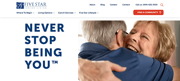 Elderly man and woman hugging with smiles at Five Star Senior Living, one of the best assisted living communities. Text on image reads, "Never Stop Being You.